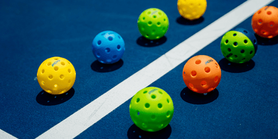 What’s the difference between indoor and outdoor pickleballs?